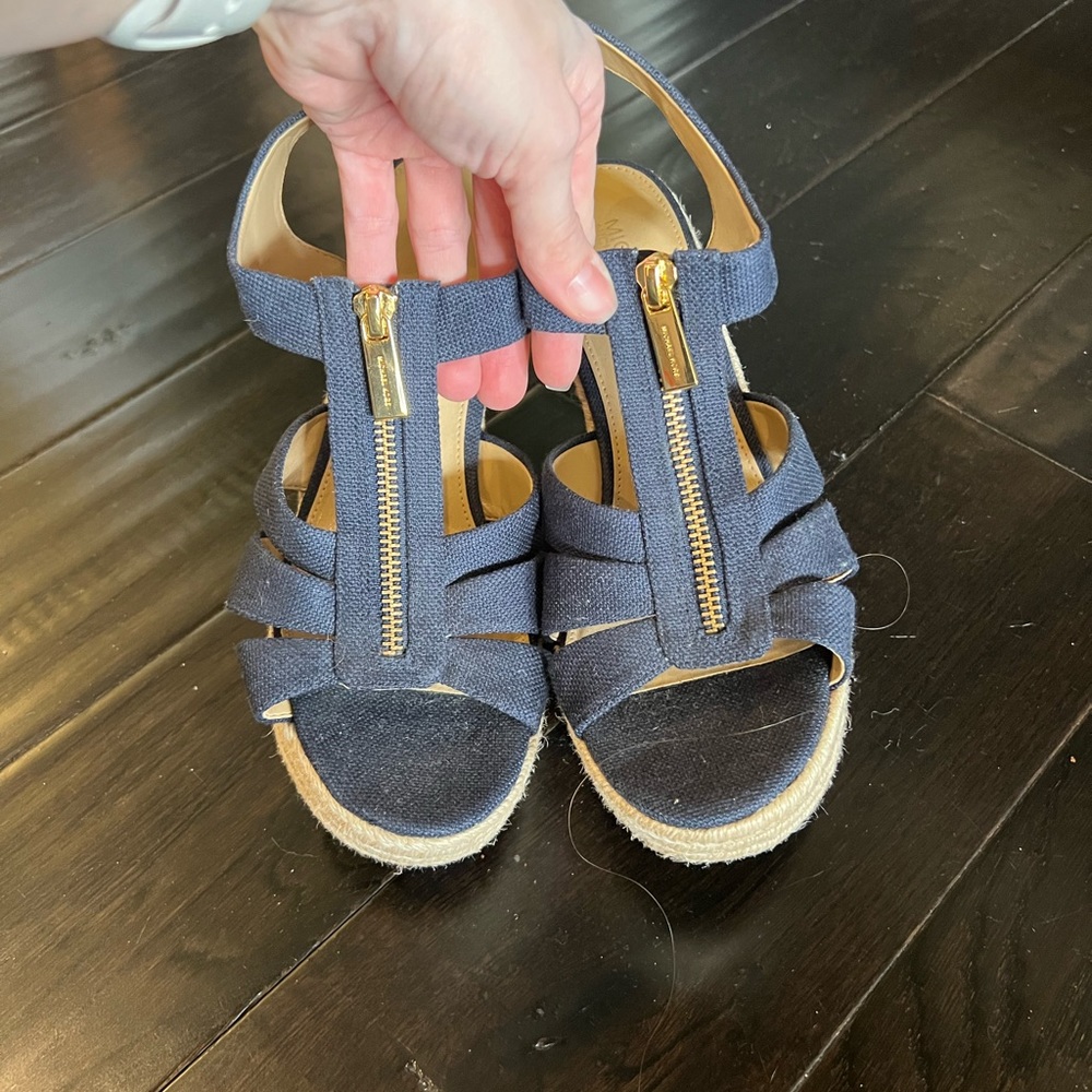 Michael Kors navy wedge with gold zipper detail. Size 7. New with tags.